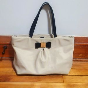 Kate Spade Nylon purse with super cute bow detail. Cream and black.